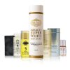The MIRACLE GLOW SET (WITH ORGANIC BODY OIL) by Bella Nubian includes a large Miracle Super White Body Lotion, Organic Body Oil, creams, and capsules artfully arranged.