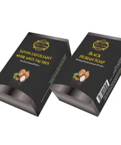 Deux boîtes noires de savon se trouvent côte à côte. La boîte de gauche, intitulée «NOUVEAU SAVON NOIR AVEC HUILE D'ARGAN», présente un mélange de savon noir et d'huile d'argan. La boîte de droite est intitulée « Savon noir de Nubie ». Les deux boîtes portent une image de noix.