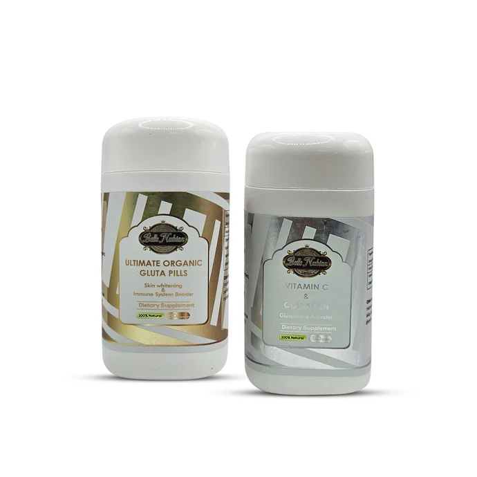 Deux flacons blancs étiquetés « PILULES BIO ULTIMES + VITAMINE C & COLLAGÈNE » avec des accents d’or et d’argent sont présentés côte à côte-le set le plus éclairant, formulé pour une peau éclatante. Deux flacons blancs étiquetés "PILULES BIO ULTIMES + VITAMINE C & COLLAGÈNE" avec des accents d'or et d'argent sont présentés côte à côte-le set le plus éclairant, formulé pour une peau éclatante.