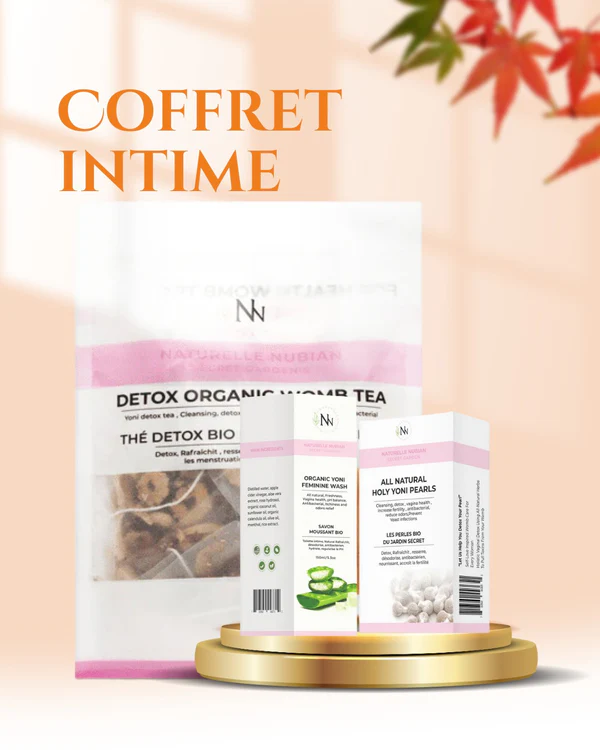 Le coffret Intime Naturelle Nubian, comprenant le thé Detox Organic Yoni et deux boîtes de bien-être nubiennes, est présenté sur une plateforme ronde en or avec des feuilles, évoquant une esthétique naturellement luxueuse et élégante. Le coffret Intime Naturelle Nubian, comprenant le thé Detox Organic Yoni et deux boîtes de bien-être nubiennes, est présenté sur une plateforme ronde en or avec des feuilles, évoquant une esthétique naturellement luxueuse et élégante.